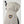 Beige Hestra mitten with a branded patch on the back of the hand