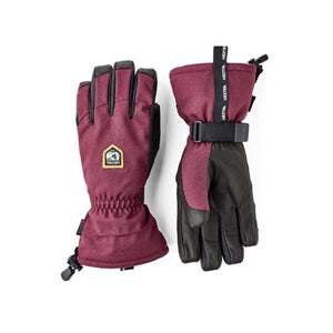 Hestra burgundy and black insulated ski gloves with adjustable wrist straps