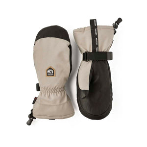 Hestra beige and black insulated winter mittens with adjustable wrist straps