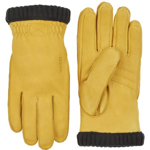 Hestra yellow leather gloves with black ribbed cuffs