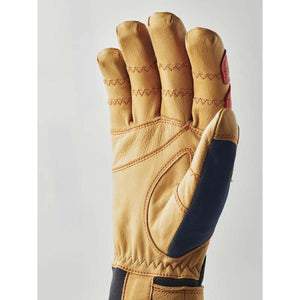 Hestra tan leather glove with red stitching and navy blue side panel