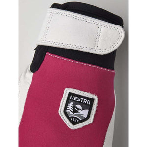 Hestra glove cuff with white velcro strap and Hestra logo patch