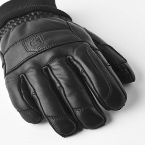 Black leather glove with ribbed cuff and embossed logo