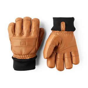 Hestra tan leather gloves with black ribbed cuffs
