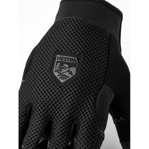 Black Hestra mesh glove with brand logo patch