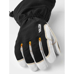 Hestra black and white leather ski glove with yellow stitching