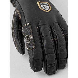 Hestra black leather glove with contrast stitching and Hestra logo patch