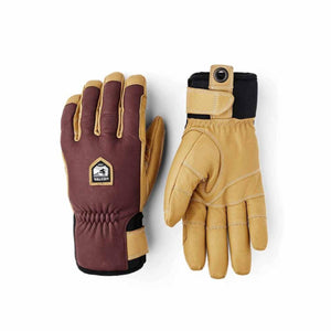 Hestra leather gloves in maroon and tan with black cuffs
