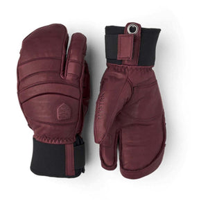 Hestra burgundy leather three finger ski mittens with black cuffs