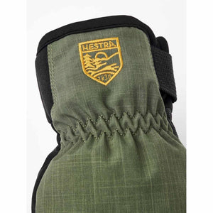 Olive green Hestra glove cuff with elasticated wrist and embroidered brand logo patch