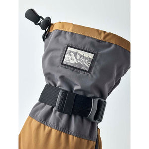 Hestra glove cuff with adjustable strap and mountain logo patch