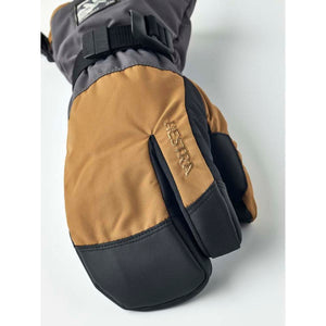 Hestra brown and black insulated winter mitten with adjustable wrist strap