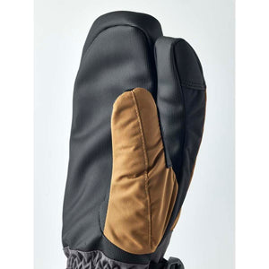 Black and brown winter mitten with textured fabric