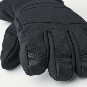Black Hestra glove showing textured fabric and reinforced finger tips