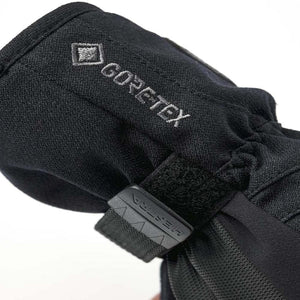 Black Hestra glove cuff with Gore-Tex embroidery and adjustable strap