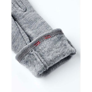 Hestra grey wool glove cuff with fleece lining and red stitching detail