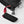 Hestra glove cuff detail with red pull tab and black wrist strap