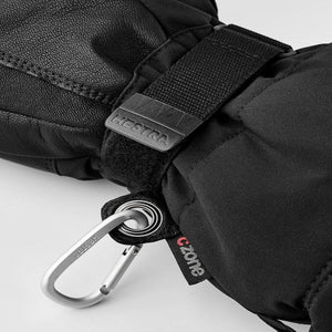 Close up of black Hestra glove with velcro strap and metal carabiner