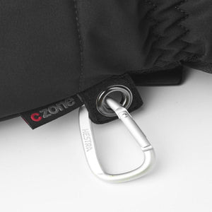 Hestra glove detail featuring a Czone label and a silver carabiner attachment
