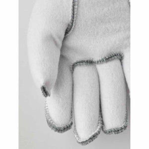 Hestra light grey fleece glove showing finger detail and stitched seams