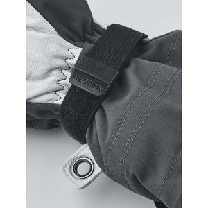 Hestra glove wrist strap with velcro closure and metal eyelet
