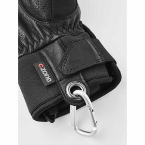 Hestra black leather glove cuff with CZone label and silver carabiner attachment