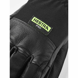 Close up of black Hestra Pro leather and fabric glove