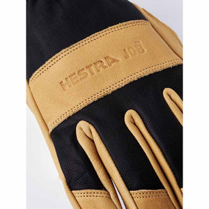 Hestra Job leather work glove with tan and black panels and embossed logo
