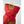 Hestra red insulated mitten cuff with yellow pull loop and brown suede detailing