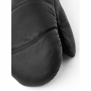 Black Hestra leather mitten close up