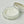 Open glass jar of Hestra leather lotion with white cream