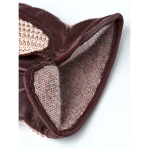 Close up of Hestra brown leather glove with textured wool lining