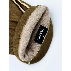 Olive green Hestra glove cuff with beige lining and size tag