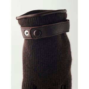 Brown knit glove with leather strap and metal snap button closure
