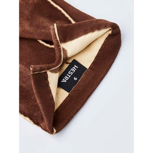 Interior of brown Hestra glove showing size 9 label