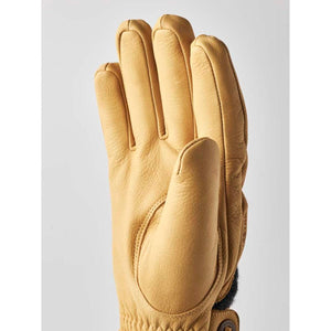 Hestra tan leather glove with a dark grey cuff