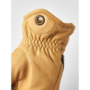 Tan Hestra leather glove cuff with metal eyelet and gathered wrist detail