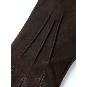 Hestra dark brown suede glove with decorative stitching on the back