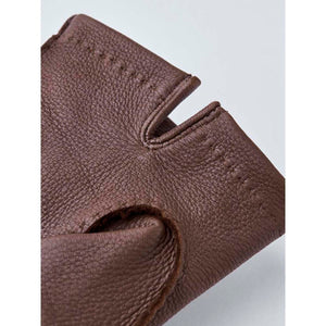 Close up of brown Hestra leather glove texture and stitching