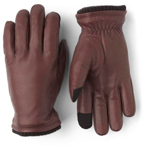 Hestra brown leather gloves with ribbed cuffs and black fingertip details