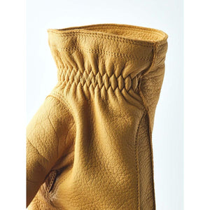 Close up of Hestra tan leather glove cuff with elasticated wrist detail