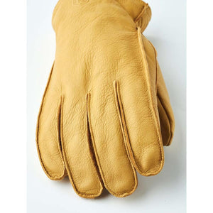 Tan leather work glove with stitched seams