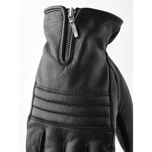 Black Hestra leather glove with a zippered cuff