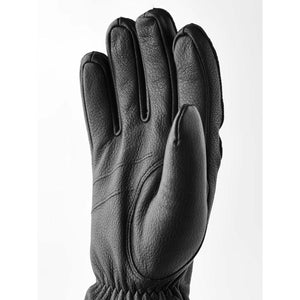 Black leather glove with textured finish and gathered wrist
