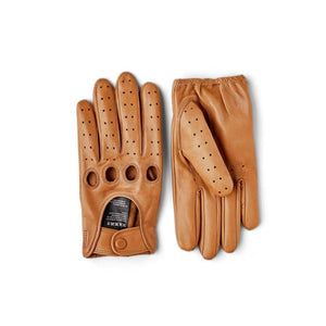 Hestra tan leather driving gloves with perforated fingers and knuckle cutouts