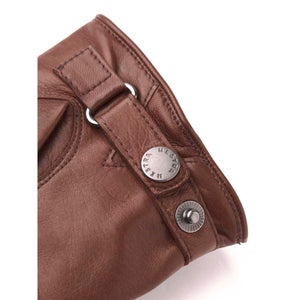 Brown leather Hestra glove cuff with metal snap button closure