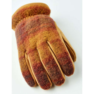 Hestra glove with tan leather palm and multi-colored wool back