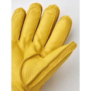 Yellow Hestra leather glove palm detail