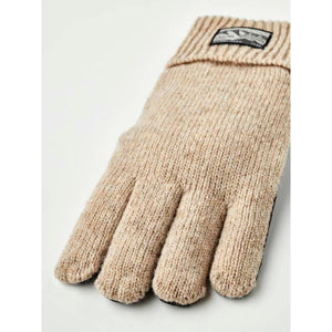 Beige Hestra knit glove with ribbed cuff and brand logo patch