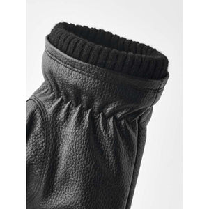 Hestra black leather glove cuff with ribbed knit trim